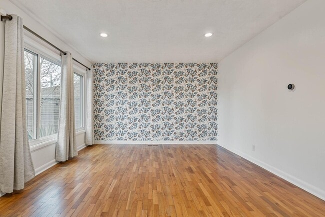 Building Photo - Beautiful, modern 4-bdrm/2-bath home in Concordia—Private, urban sanctuary w/ flex spaces