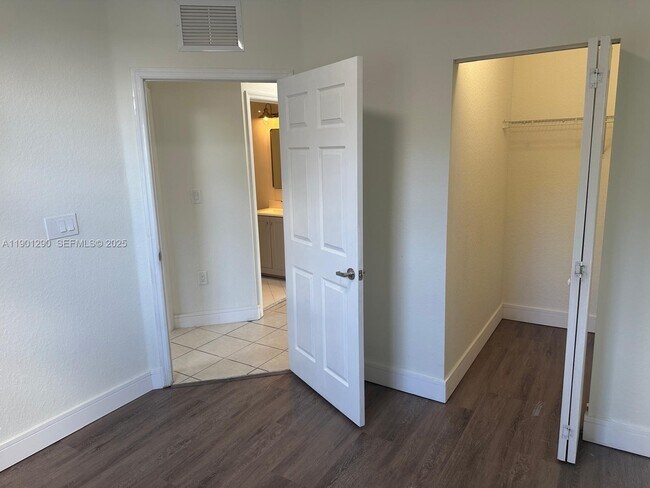 Building Photo - 3390 NE 13th Cir Dr