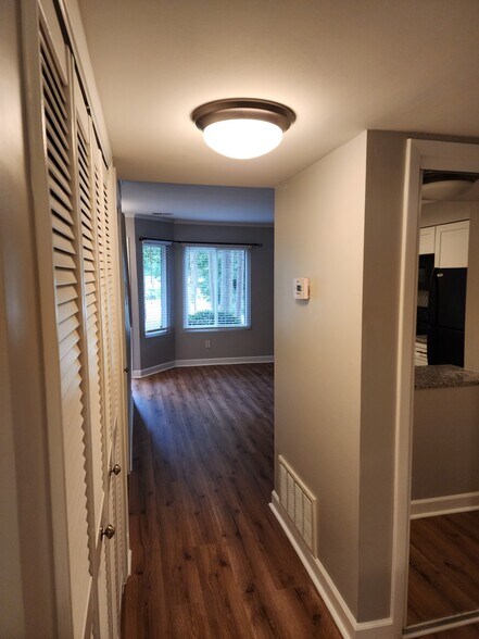 View from kitchen hall to living room - 6967 Staghorn Ln