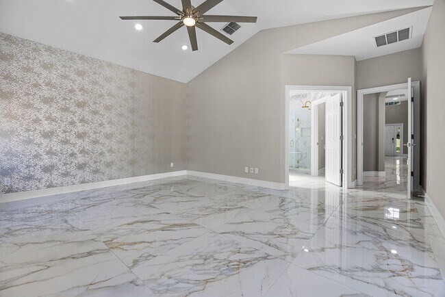 Building Photo - Fully Remodeled 5/4 Art Deco-Inspired Home...