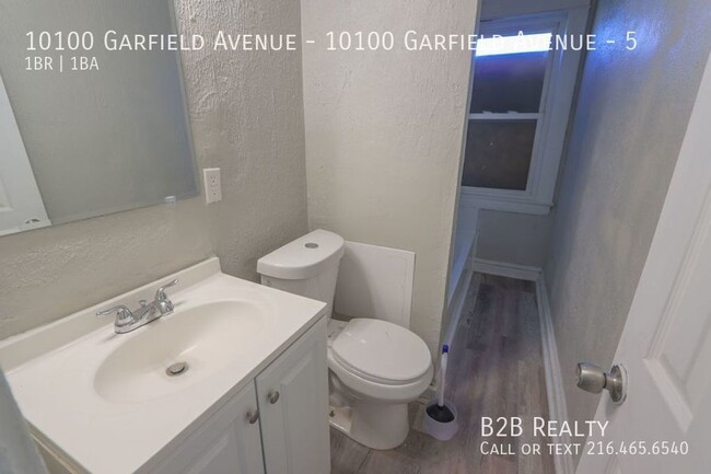 Building Photo - "Charming 1-Bedroom Oasis: Your Perfect Bl...