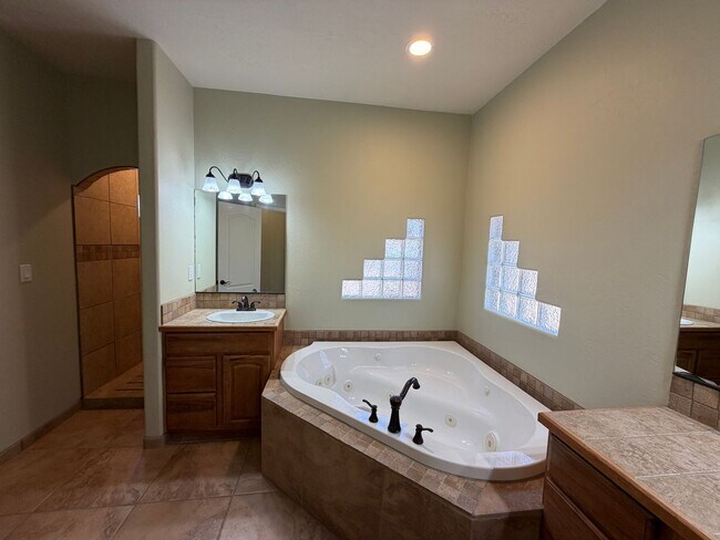 Building Photo - 4 Bedroom Single Story Custom Home Available In Rio Rancho Near Unser Blvd SE & Westside Blvd SE!