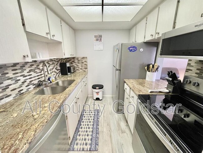 Building Photo - 25 Quails Run Blvd