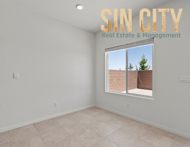 Building Photo - "Charming 4-Bed Home on Love Springs Ln: Spacious 1865 Sq Ft with 2.5 Baths in North Las Vegas!"