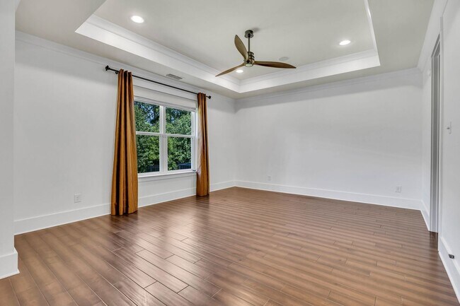 Building Photo - Beautifully maintained and move-in ready, this stunning mostly one-level all-brick home
