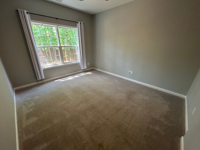 Building Photo - 4 Bedroom | 3 Bathroom Apex Home with Fenc...