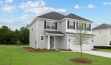 Building Photo - 4 Bed/2.5 Bath in The Commons