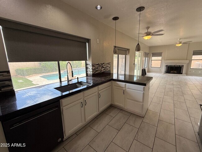 Building Photo - 3611 N 109th Dr