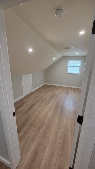Bedroom #3: 15'9" x 9'6" bedroom includes a spacious walk-in closet and additional storage space - 604 Holly Ln