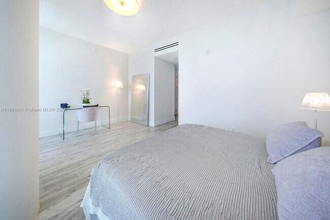 Building Photo - 10203 Collins Ave