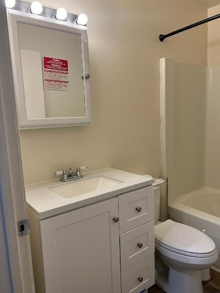 new bathroom vanity, toilet - 2634 N Charles St