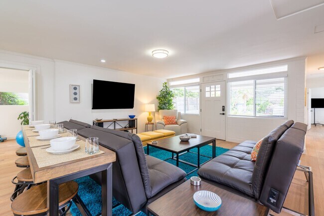 Building Photo - Enjoy stunning sunsets and beach living at its finest, Short Walk to Beach