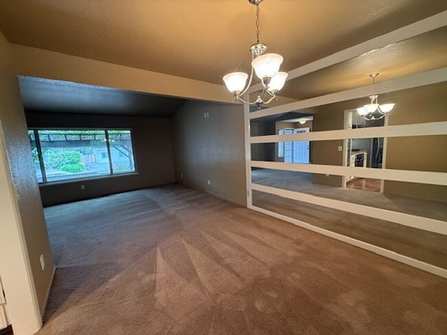 Building Photo - OPEN HOUSE this Wednesday 5pm-6:30pm - Private Redwood Setting | 4BR Home with Family Room, Bar &...