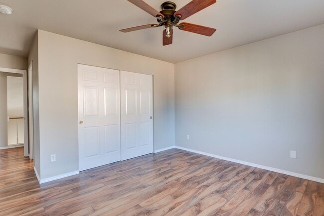 Building Photo - Spacious 4-Bedroom Home with Cozy Backyard...