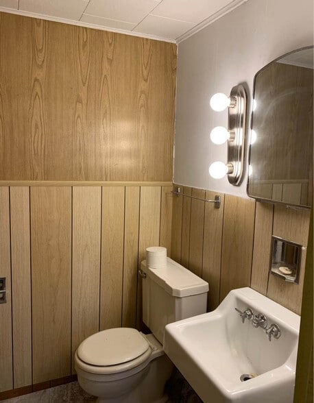 1/2 bath on main floor off of the kitchen - 200 E 6th St