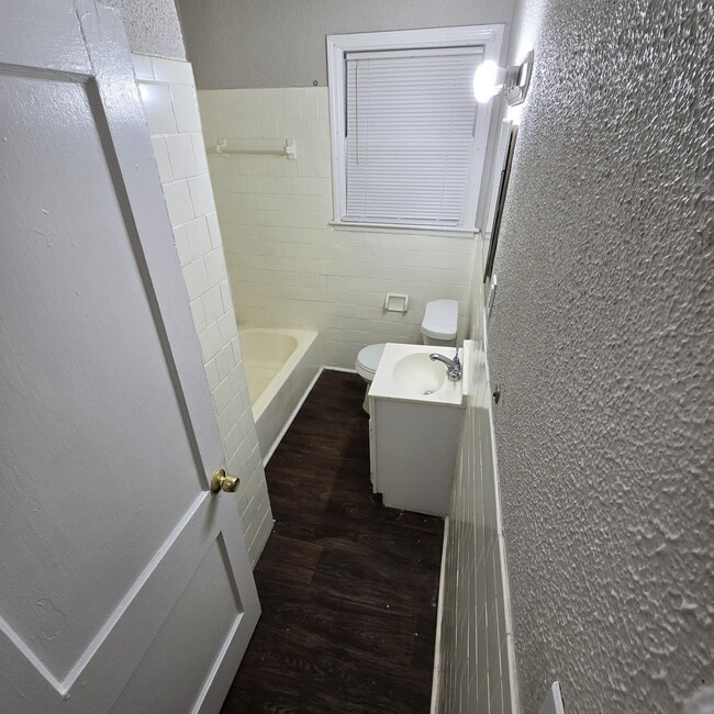 Building Photo - Full brick 3 bedroom, 1 and half bath home with screened in side porch, and an attic for extra st...