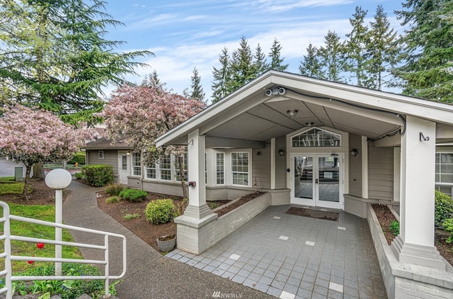 Building Photo - 2BR Condo w/ Vaulted Ceilings, W/D, Parking & Amenities | Utilities Included