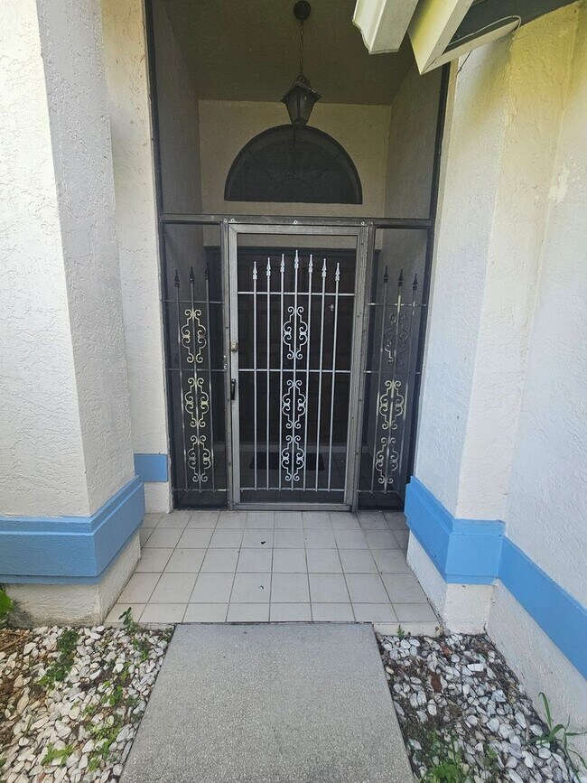 Building Photo - 3/2/2 Annual Rental available with lawn care included!!