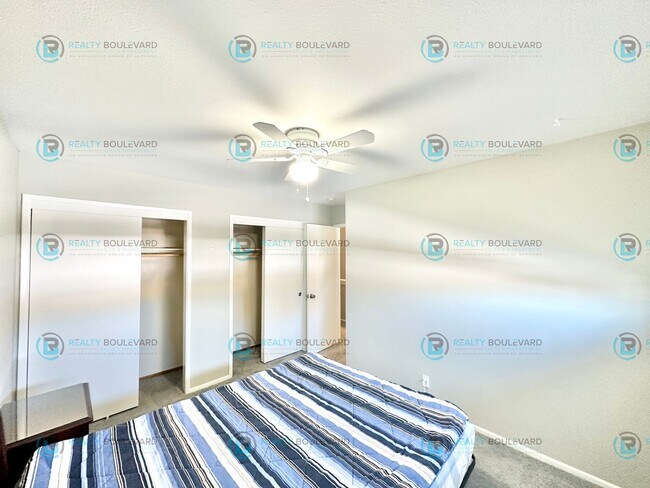 Building Photo - 2-bed, 2-bath, 2-story townhome with pool and park like setting outside the front door.