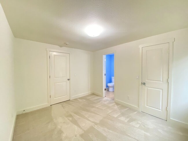 Building Photo - Fantastic location for this spacious 2 level townhouse