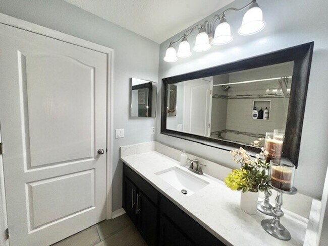 Building Photo - Lake Nona!! Spectacular 4X2 in Gated Nona Crest! All tile flooring!! 2 car garage! Move in April ...