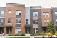 Building Photo - Like New Townhome With Your Own Rooftop Views of Downtown Indy!