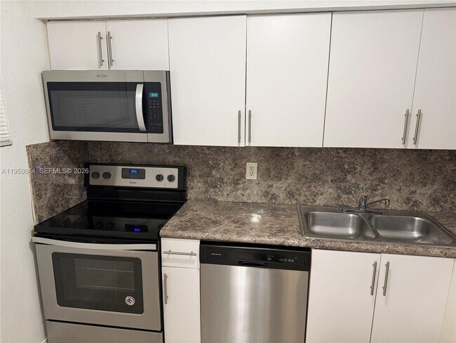 Building Photo - 4235 N University Dr