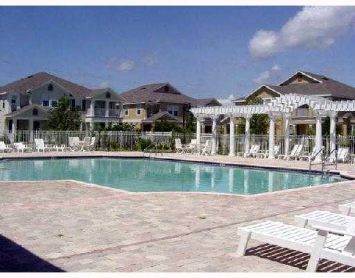 Building Photo - MOVE IN SPECIAL- Beautiful 3/2.5 Harmony Condo.