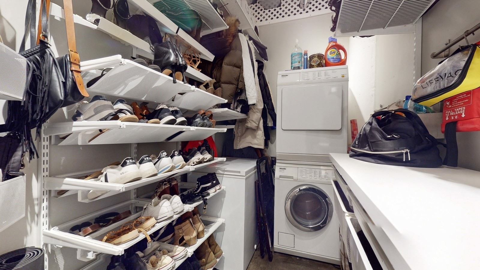 Elfa closet system for coats, shoes, scarves along with in unit washer/dryer and deep freezer - 730 Stinson Blvd