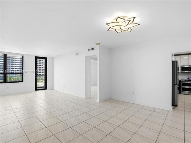 Building Photo - 10185 Collins Ave