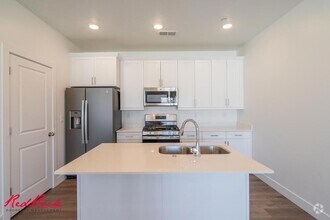 Building Photo - Stylish Desert Color 2 Bedroom Condo. Wash...