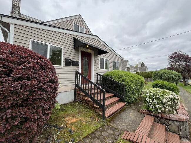 Building Photo - Character-Filled Concordia Home with Flexible Living Spaces & Gas Fireplace