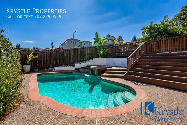 Building Photo - Large Home & Yard w/Sparkling Pool & Jacuzzi!