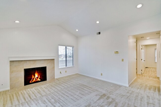 Building Photo - Spacious condo available in desirable Newpark Village community!