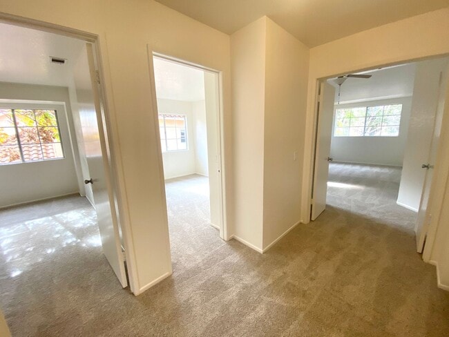 Building Photo - NEW PRICE! Spacious 3bdrm 2.5bath Condo w/2 car garage & private laundry hookups, community Pool ...