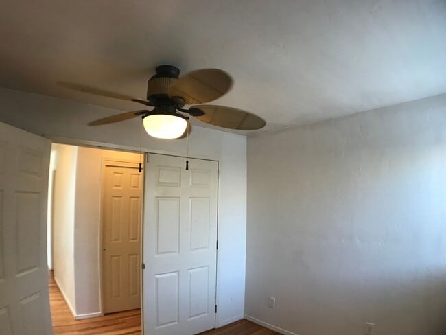 Building Photo - BEAUTIFUL WOOD FLOORS IN THIS 5 BED 2 BATHROOM HOUSE- LARGE DOGS OK