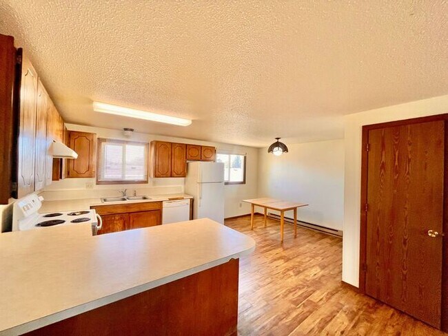 Building Photo - TWO WEEKS FREE RENT - Water/Sewer/Trash Included - Large Two Bedroom One Bath In North Loveland! ...