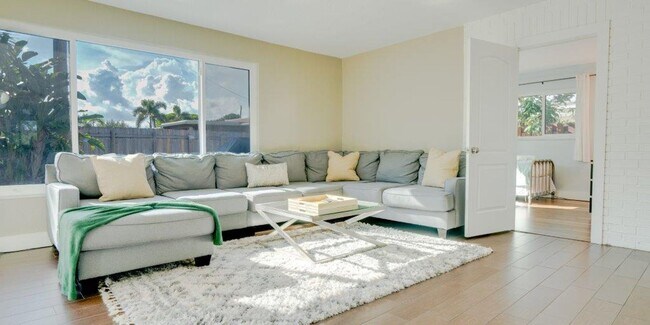 Building Photo - Step Into Sunshine: Modern Charm Meets Coa...