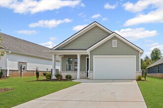 Building Photo - New 3BR Home in Whispering Woods – Modern ...