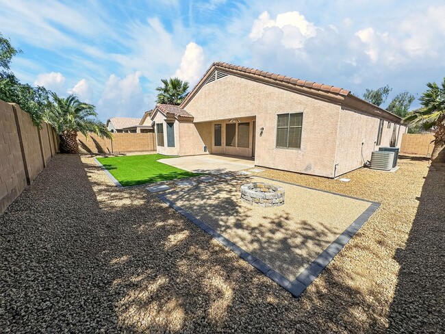Building Photo - Single-level 4 bed, 2 bath home with tandem 3-car garage and RV gate.