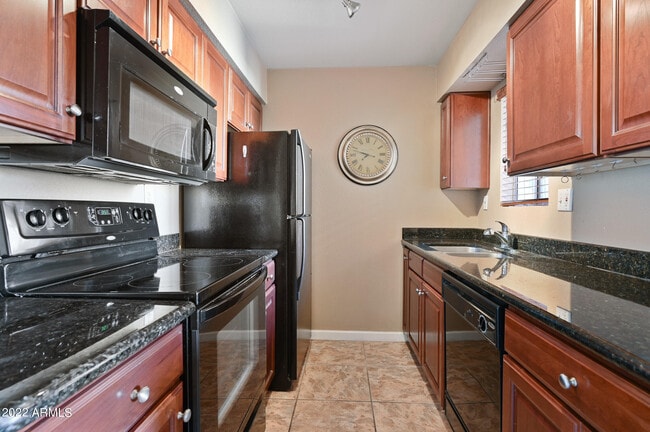 Building Photo - 5877 N Granite Reef Rd