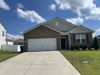 Building Photo - 4-Bedroom w/ Open Layout & Community Perks