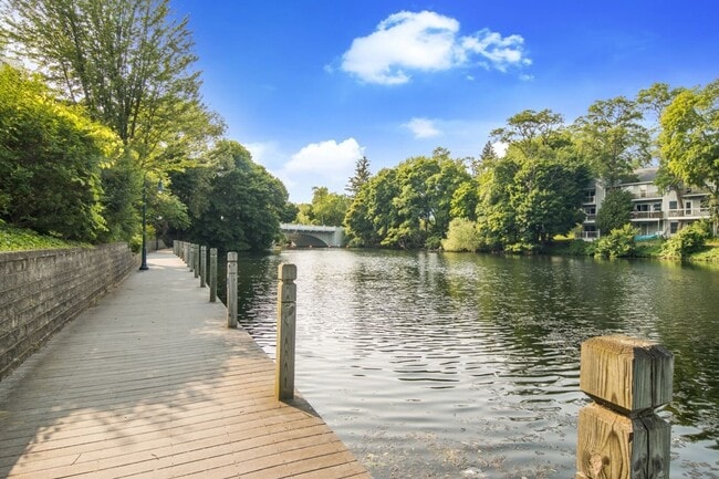 Building Photo - Furnished Pet-Friendly 30-Day Extended Stay Riverfront Condo