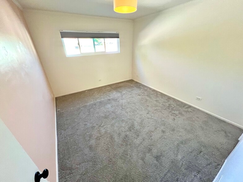 Bedroom #2 painted white - 721 Cedar St