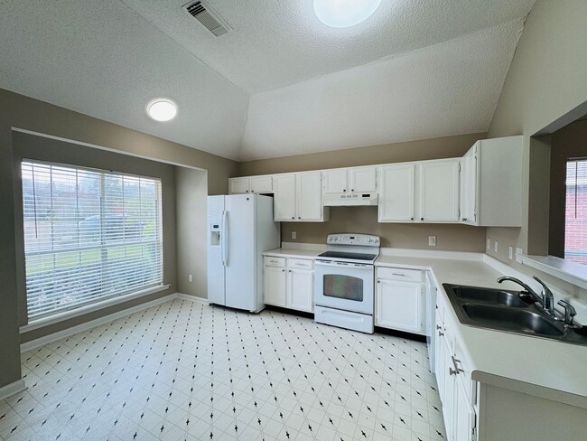 Building Photo - Your new home is just a putt away with thi...