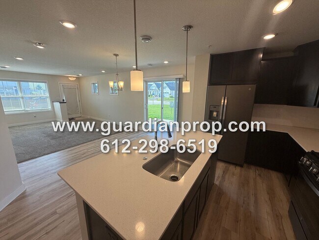 Building Photo - End Unit Townhouse Available Now, Open Floor Plan, Loft Area, Large Primary Suite, Side Patio