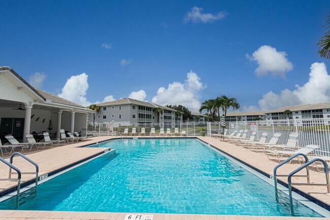 Building Photo - AVAILABLE NOW! Top-Floor Condo | Gated Community | Preserve Views | Water, Sewer & Cable Included