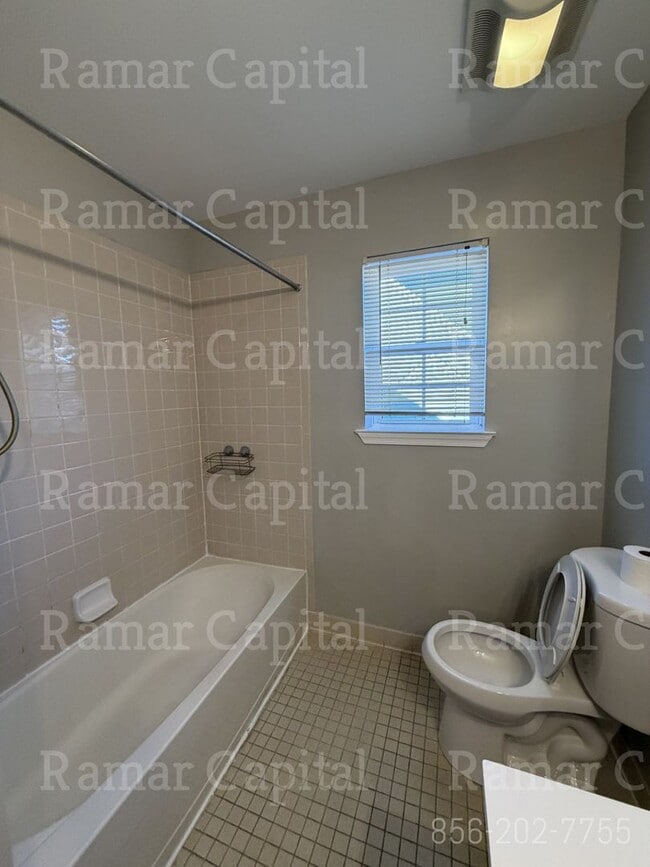 Building Photo - Spacious & Welcoming Home Designed for Family Living