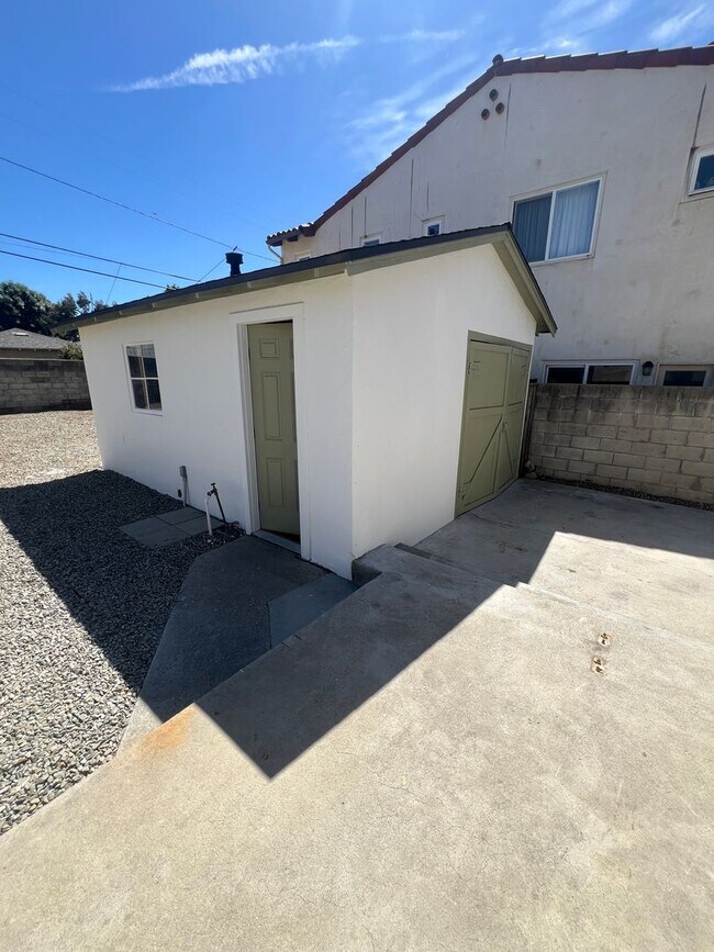 Building Photo - CHARMING! Remodeled 2 Bedroom home with storage and yard