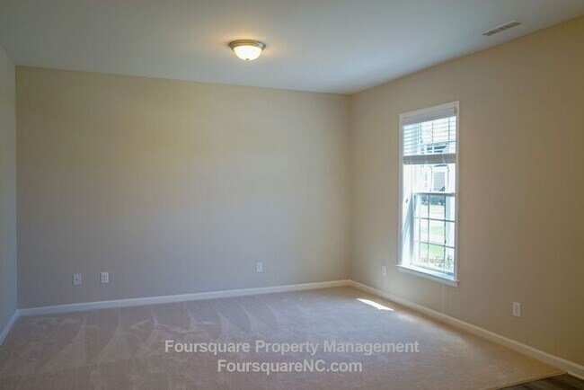 Building Photo - Modern 3-Story Townhome with Entry-Level Bonus Room, Back Deck & Garage , Community Pool in North...